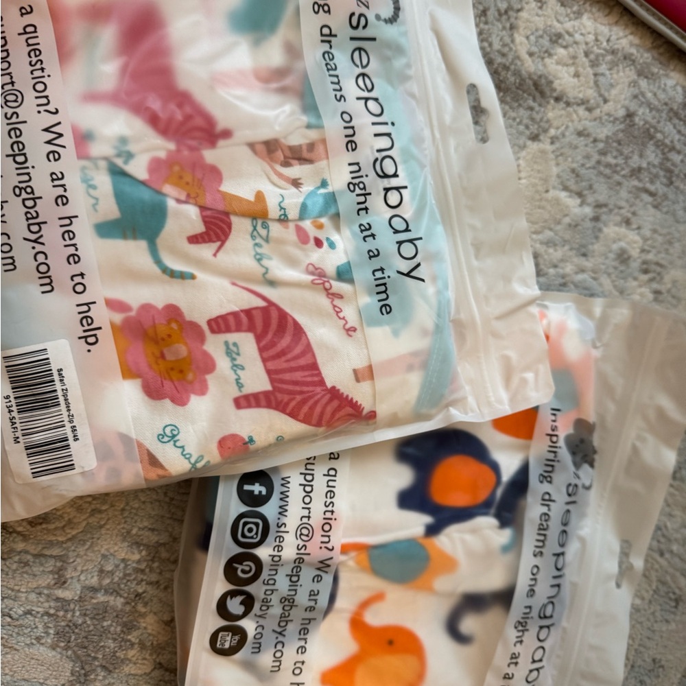 2 new size M sleeping baby zipadee sleep suits- 6-12 months